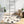 Load image into Gallery viewer, Grey and White Patchwork Round Cowhide Rug - Staunton and Henry