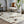 Load image into Gallery viewer, Cream and Fawn Triangle Patchwork Hide Rug - Staunton and Henry