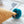 Load image into Gallery viewer, Triangle Pom Pom Cushion - Staunton and Henry