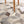 Load image into Gallery viewer, Grey and White Patchwork Round Cowhide Rug - Staunton and Henry