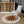 Load image into Gallery viewer, Beige and Cream Round Patchwork Hide Rug - Staunton and Henry