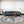 Load image into Gallery viewer, Abstract Gold and Grey Round Rug - Staunton and Henry