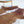 Load image into Gallery viewer, Premium Brown and White Faux Cowhide Rug - Staunton and Henry