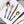Load image into Gallery viewer, Retro Gold Stainless Steel Cutlery Set with Black Handles - Staunton and Henry
